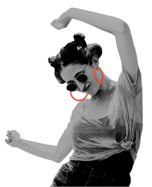 Woman with hoop earrings dancing and waving arms