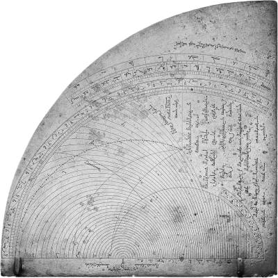 A quarter circle stone surface with a pattern of fine arc tracings