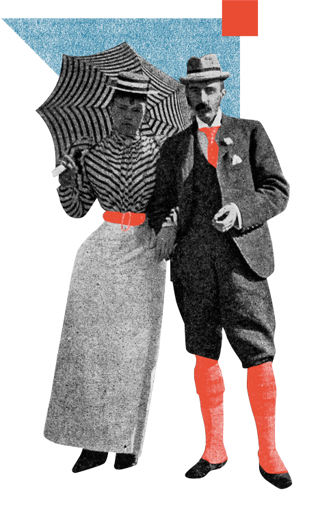 A couple in old-timey dress holding a striped umbrella